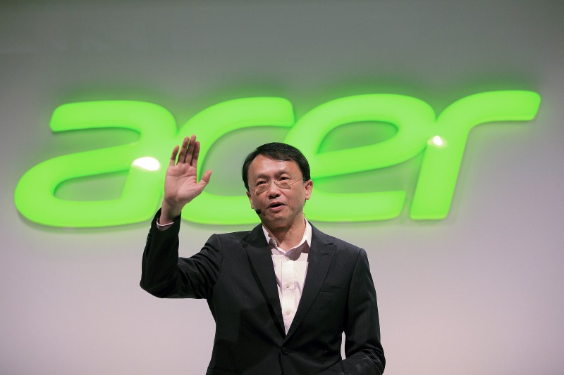 Jason Chen, chief executive officer of Acer Inc., gestures whilst speaking during a news conference at the IFA Consumer Electronics Fair in Berlin, Germany, on Wednesday, Sept. 3, 2014. IFA is Europe's largest consumer electronics show and runs Sept. 5-10. Photographer: Krizstian Bocsi/Bloomberg *** Local Caption *** Jason Chen